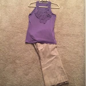 Sleeveless purple blouse with ruffle